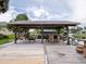 Relaxing waterfront dock with cozy seating and a functional bar, perfect for enjoying the lake view at 1639 Yellow Brick Rd, Astor, FL 32102