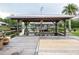 Waterfront dock featuring multiple boat slips and relaxing lounge space, ideal for boating enthusiasts at 1639 Yellow Brick Rd, Astor, FL 32102