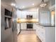 Well-appointed kitchen featuring stainless steel appliances and granite countertops at 1639 Yellow Brick Rd, Astor, FL 32102