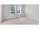 Inviting bedroom with neutral carpeting, ample natural light, and a serene atmosphere for relaxation at 1978 J Lawson Blvd, Orlando, FL 32824
