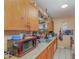 Functional kitchen with essential appliances and ample cabinet space for storage at 205 W Division St, Deland, FL 32720