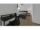 Cozy bedroom with a desk, comfortable bed, and a calming atmosphere at 2210 Derwent Dr, Davenport, FL 33896