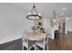 This angle provides a clear view of how the dining space connects to the kitchen and other rooms at 2210 Derwent Dr, Davenport, FL 33896