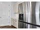 This modern kitchen features stainless steel appliances, light countertops, and contemporary cabinetry for a clean, stylish look at 2210 Derwent Dr, Davenport, FL 33896