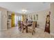 Inviting dining area featuring a large table with seating for six and natural light at 2312 Poinciana Rd, Winter Park, FL 32792