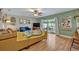 Bright living room with patio access, connecting indoor and outdoor spaces at 2312 Poinciana Rd, Winter Park, FL 32792