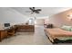 Spacious bonus room featuring a ceiling fan, ideal for use as a media room or recreation area at 287 Hilltop Dr, Longwood, FL 32750