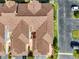 An aerial view of the townhome roofs and an enclosed patio shows the property's layout and location at 2926 Claremont Ct # Ge, Orlando, FL 32822