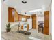 Bright kitchen features oak cabinets, granite countertops, white appliances, and a cozy breakfast nook at 2926 Claremont Ct # Ge, Orlando, FL 32822