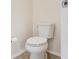 A standard white toilet with the toilet paper holder on the wall at 2926 Claremont Ct # Ge, Orlando, FL 32822