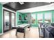 Bright game room with air hockey table and stylish contemporary decor at 3126 Wolf Lake Ave, Apopka, FL 32712