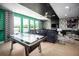 Vibrant game room with air hockey table, contemporary decor, and entertainment space at 3126 Wolf Lake Ave, Apopka, FL 32712