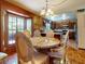 Charming breakfast nook adjacent to the kitchen with plenty of natural light at 3443 S Mellonville Ave, Sanford, FL 32773