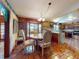 Charming breakfast nook with tiled floors, views of the kitchen, and ample seating at 3443 S Mellonville Ave, Sanford, FL 32773