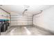 Spacious two car garage with automatic door, and concrete flooring at 4236 Newtonhall Dr, Orlando, FL 32826