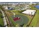 Resort-style community featuring tennis and basketball courts, swimming pools, and lush landscaping at 4740 Sleepy Hollow Dr, Kissimmee, FL 34746