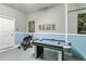 Fun game room featuring an air hockey table, and comic book decor; great for entertaining guests at 4740 Sleepy Hollow Dr, Kissimmee, FL 34746