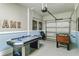 Finished garage space features an air hockey table, foosball table, and painted walls at 4740 Sleepy Hollow Dr, Kissimmee, FL 34746