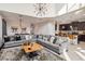 Large living room with open floor plan and view of the kitchen and dining area at 4740 Sleepy Hollow Dr, Kissimmee, FL 34746
