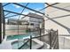 Inviting screened-in pool and spa with crystal clear water, perfect for relaxation and recreation at 4740 Sleepy Hollow Dr, Kissimmee, FL 34746