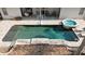 Aerial view of the pool and patio area surrounded by stone at 6198 Linneal Beach Dr, Apopka, FL 32703