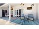 Back patio featuring outdoor seating with a decorative rug and ceiling fan at 6198 Linneal Beach Dr, Apopka, FL 32703