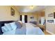 Spacious bedroom with a view of the en-suite bathroom and backyard at 6198 Linneal Beach Dr, Apopka, FL 32703