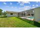 Spacious backyard with a screened pool at 620 Marshall St, Altamonte Springs, FL 32701