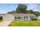 Charming single story home with a well-manicured lawn, attached garage and pleasing curb appeal at 620 Marshall St, Altamonte Springs, FL 32701