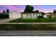 Charming single-story home with a well-manicured lawn and attached garage at 620 Marshall St, Altamonte Springs, FL 32701