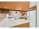 An extended countertop in a kitchen featuring classic cabinets, a sink, and essential appliances at 620 Marshall St, Altamonte Springs, FL 32701