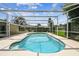 Enjoy a refreshing swim in this screened-in backyard pool at 620 Marshall St, Altamonte Springs, FL 32701