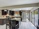 Spacious kitchen with dark cabinets, stainless steel appliances, and a large island at 620 Wood Dr, Kissimmee, FL 34759