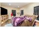 Bedroom featuring laminate floors, neutral walls, and natural light at 660 6Th St, Daytona Beach, FL 32117