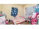 A bedroom featuring playful decor, learning materials, and cozy bedding at 660 6Th St, Daytona Beach, FL 32117