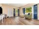 Inviting living room with hardwood floors, natural light and two comfortable armchairs at 660 6Th St, Daytona Beach, FL 32117