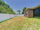 Wide backyard featuring perimeter privacy fence at 6843 Cherry Grove Cir, Orlando, FL 32809