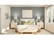 Bright main bedroom with contemporary decor, a cozy rug, and sunlit windows at 7183 Rosy Sky Ave, Orlando, FL 32829
