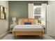 Serene bedroom with stylish decor, soft lighting, and comfortable furnishings at 7183 Rosy Sky Ave, Orlando, FL 32829