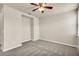Cozy bedroom with carpet flooring, a ceiling fan, and recessed lighting at 8230 Corkfield Ave, Orlando, FL 32832