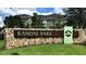 Community entrance sign that reads 'Randal Park' sitting on a stone wall at 8230 Corkfield Ave, Orlando, FL 32832