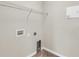 Convenient laundry room ready for appliances with tile floors and ample connections at 8230 Corkfield Ave, Orlando, FL 32832