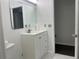 Bathroom featuring modern vanity with bright light and tiled flooring at 909 San Paulo Way, Kissimmee, FL 34758