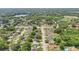 Community aerial displaying lush greenery, peaceful lakes, and neighborhood streets with well-spaced homes at 1017 Manchester Cir, Winter Park, FL 32792