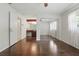 This bedroom has wood floors, a mirrored closet, and a bathroom attached at 1017 Manchester Cir, Winter Park, FL 32792