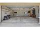 The garage features shelving, storage, and access to the backyard at 1017 Manchester Cir, Winter Park, FL 32792