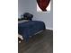 Bedroom featuring dark vinyl flooring and a window at 1212 Leon Ln, Daytona Beach, FL 32117
