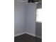 A small bedroom with a ceiling fan, vinyl floors, and a window at 1212 Leon Ln, Daytona Beach, FL 32117