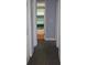 Hallway with view of the bathroom at 1212 Leon Ln, Daytona Beach, FL 32117