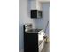 The kitchen features a microwave and electric range at 1212 Leon Ln, Daytona Beach, FL 32117
